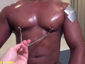 Muscular black bull enjoys nipple teasing and worship