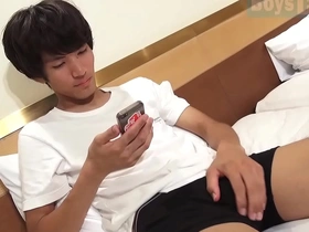 Suzuki Socks, a hot soccer player with a big cock, enjoys masturbating in a hotel room.