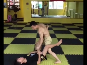 Gay twink gets his balls kicked in Asian style