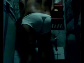 A naked man with an erection meets a Filipino in a public restroom.