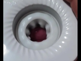 Gay Japanese man masturbates with a toy and ejaculates.