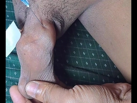 A gay man from Myanmar injecting himself with saline solution in a homemade video.