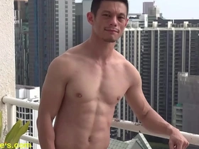 Fitness enthusiast enjoys a poolside photoshoot.