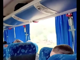 A young and an older man have a hot experience on a bus going back to Germany after Rock in Rio concert.