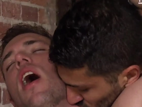 Two men kiss Alex Mecum and Adam Ramzi in this video.