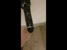 Public gym shower action with a big dildo