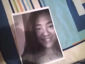 Asian beauty gets a facial with a big cum load