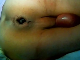Gay Asian man uses a double dildo for anal sex