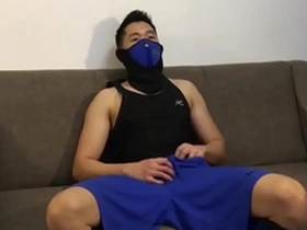 Gay Chinese handsome in mask and action